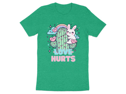 Green t-shirt with a cactus, bunny, hearts, rainbow, and the words "Love Hurts".