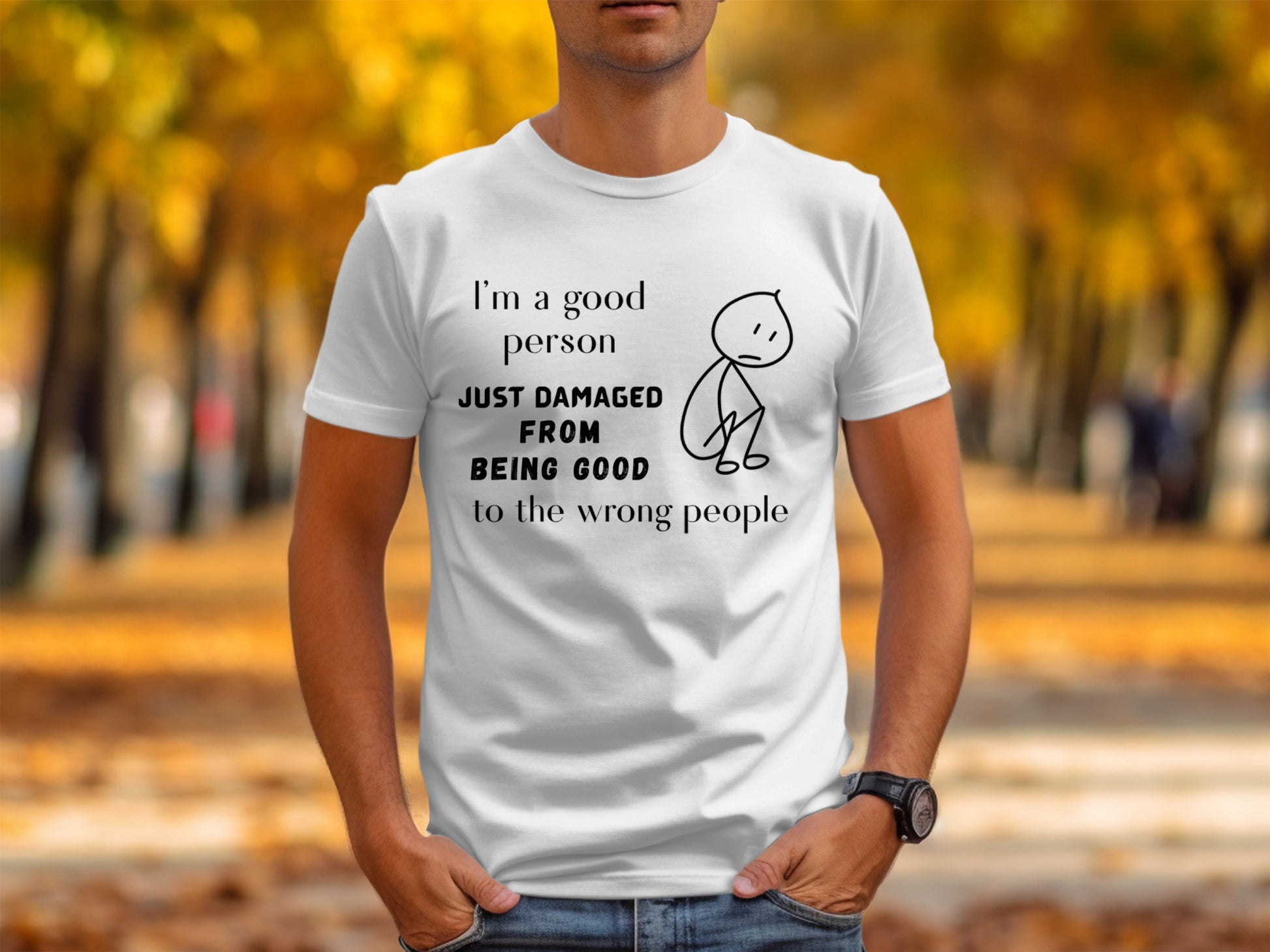 White t-shirt with black text: "I'm a good person just damaged from being good to the wrong people."