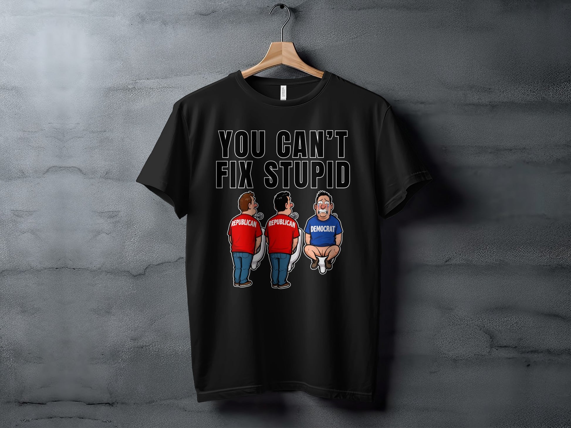 Black t-shirt with text "You Can't Fix Stupid" and cartoon of two Republicans and one Democrat.