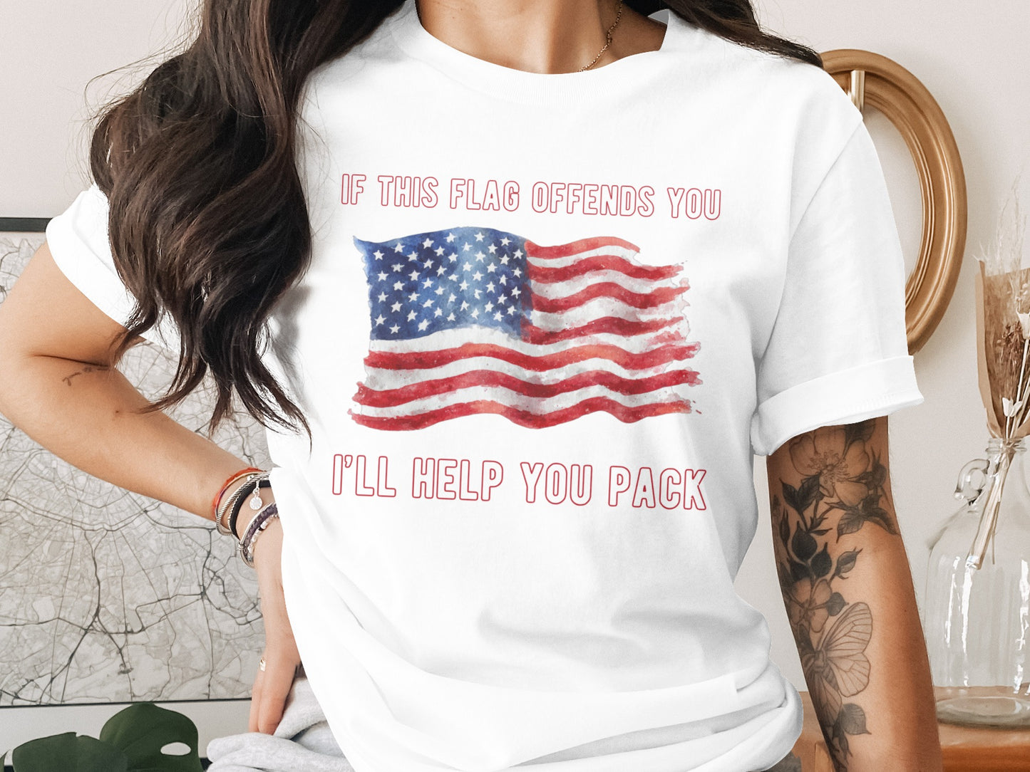 White t-shirt with watercolor American flag graphic and text "If this flag offends you I'll help you pack".