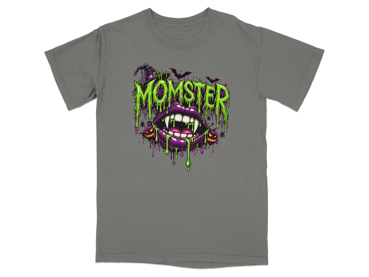 Graphic tee with "Momster" text, fangs, and Halloween imagery.