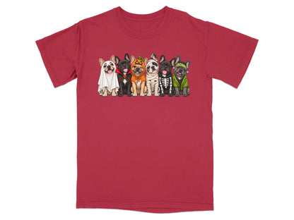 Six French Bulldogs dressed in Halloween costumes are printed on a red t-shirt.