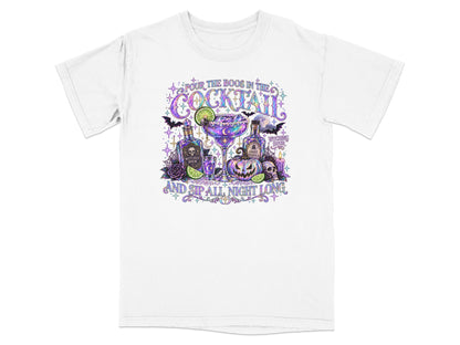 White t-shirt with Halloween cocktail graphic and text: "Pour the Boos in the Cocktail and Sip All Night Long".