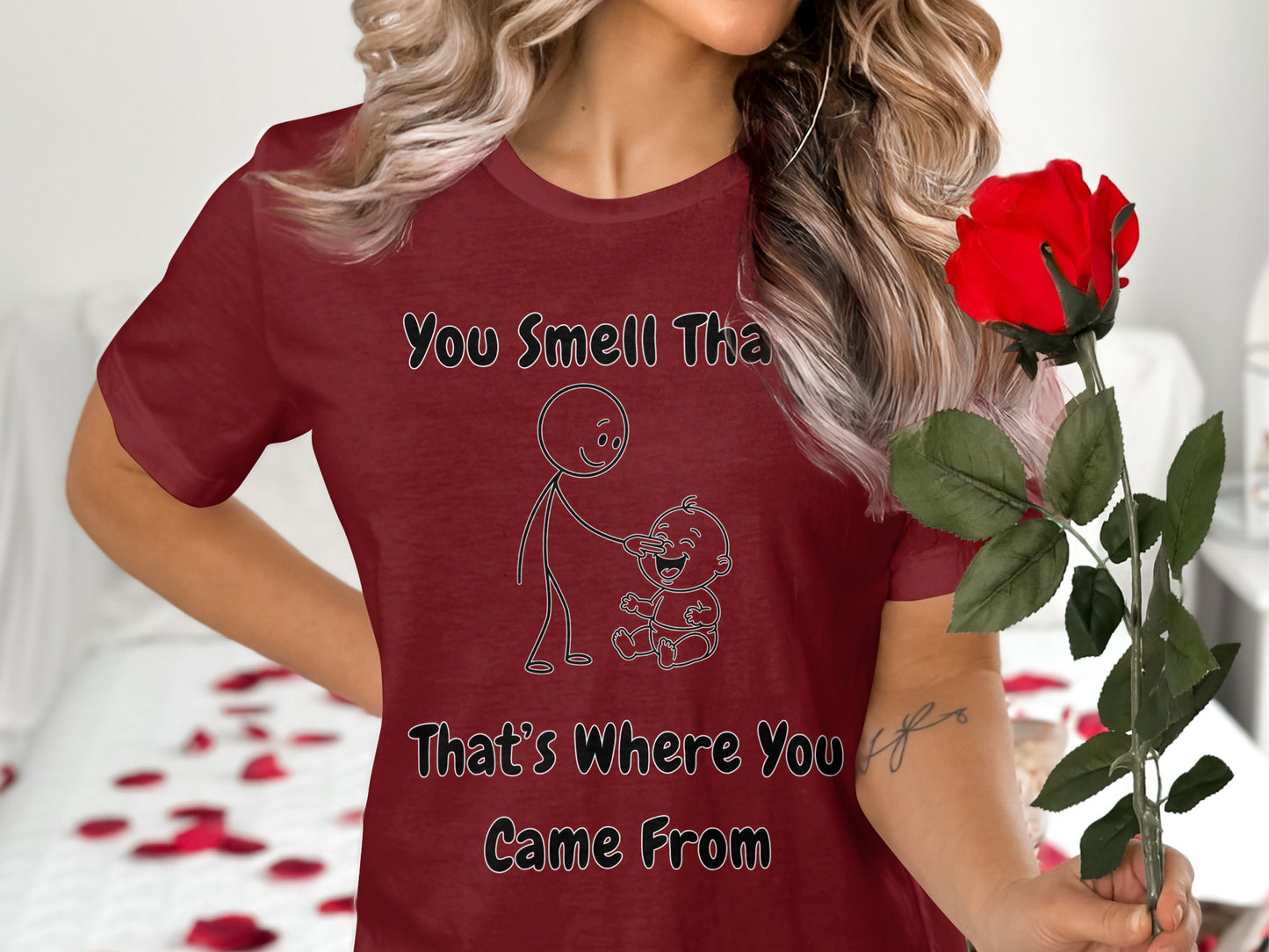 Burgundy t-shirt with "You Smell Tha That's Where You Came From" text and stick figures.