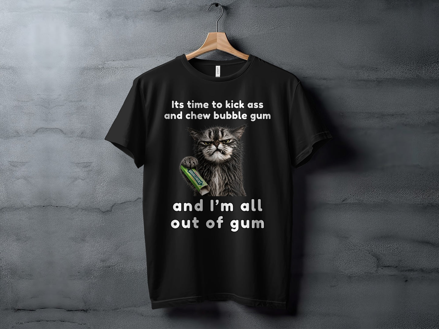 Black t-shirt with a grumpy cat holding gum and text: "Its time to kick ass and chew bubble gum and I'm all out of gum".