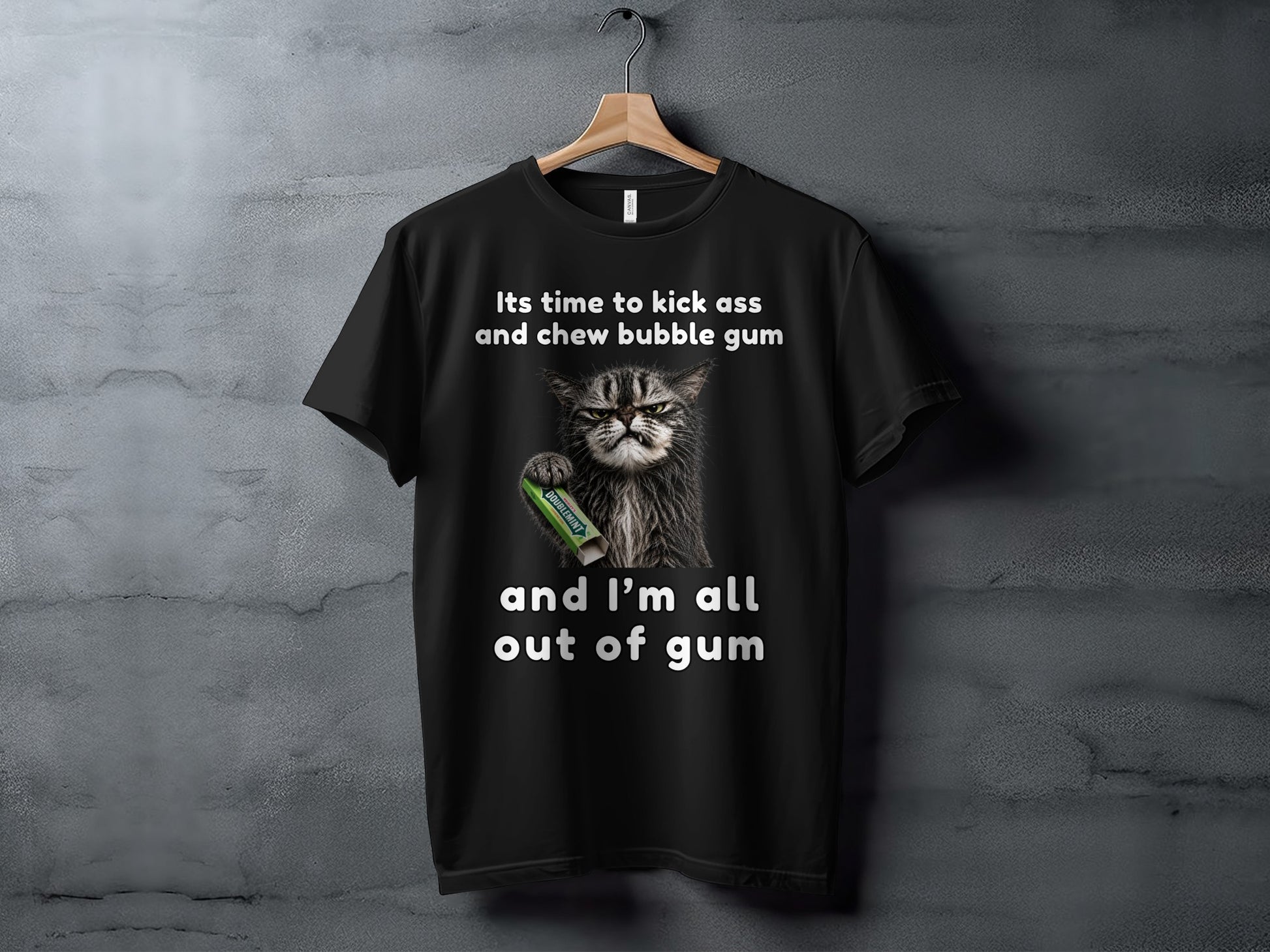 Black t-shirt with a grumpy cat holding gum and text: "Its time to kick ass and chew bubble gum and I'm all out of gum".