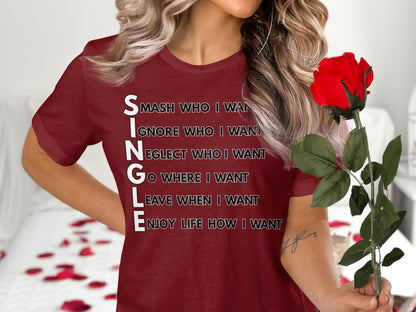 Maroon t-shirt with "SINGLE" and phrases about enjoying life independently.