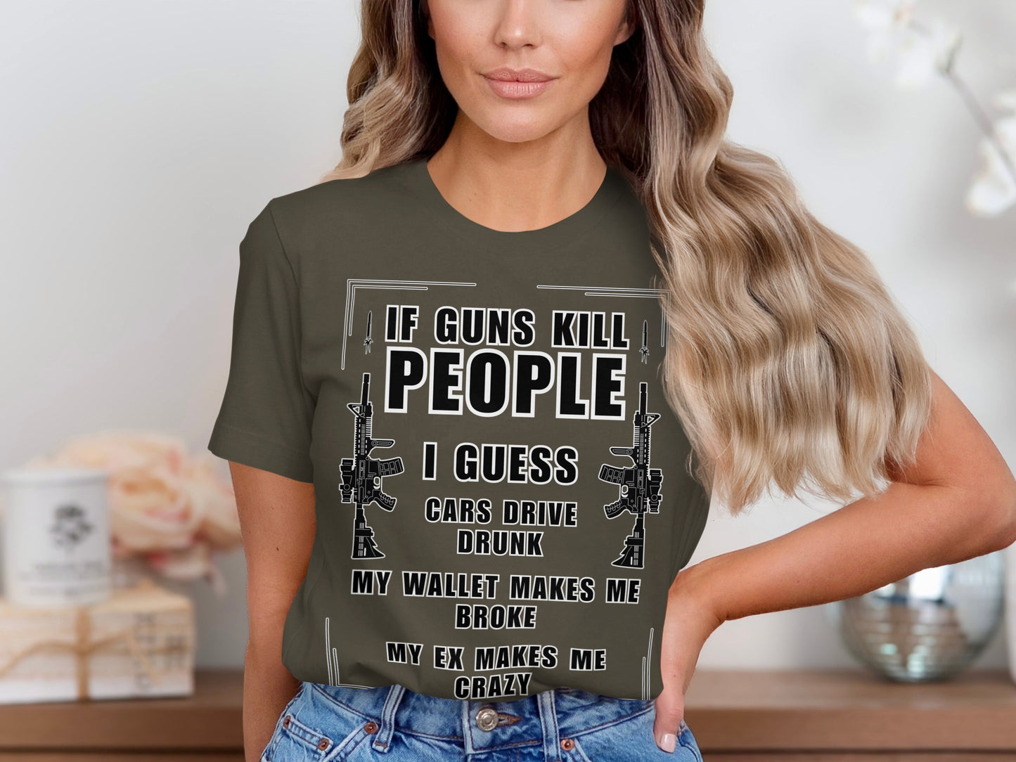 T-shirt with text "If guns kill people, I guess cars drive drunk."