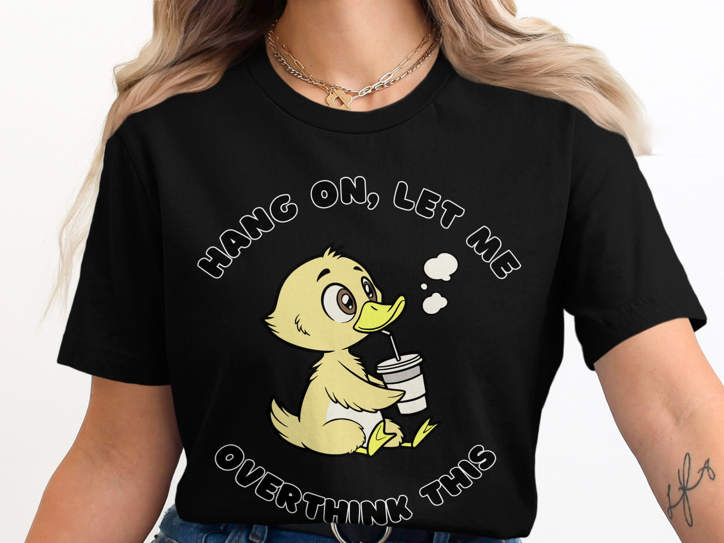 Black t-shirt with a cartoon duck saying "Hang on, let me overthink this".