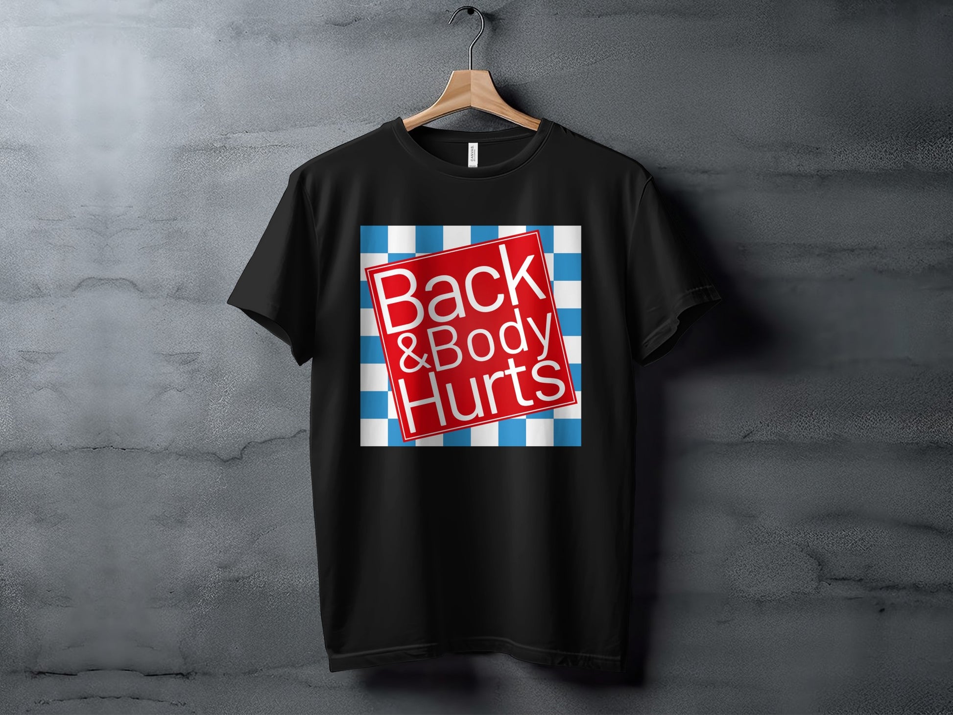 Black t-shirt with "Back & Body Hurts" graphic on a blue and white checkered background.