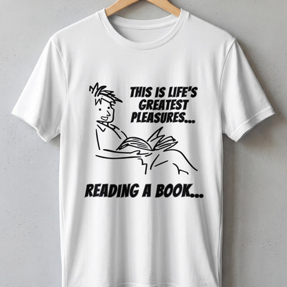 White t-shirt with black line drawing of person reading and text.