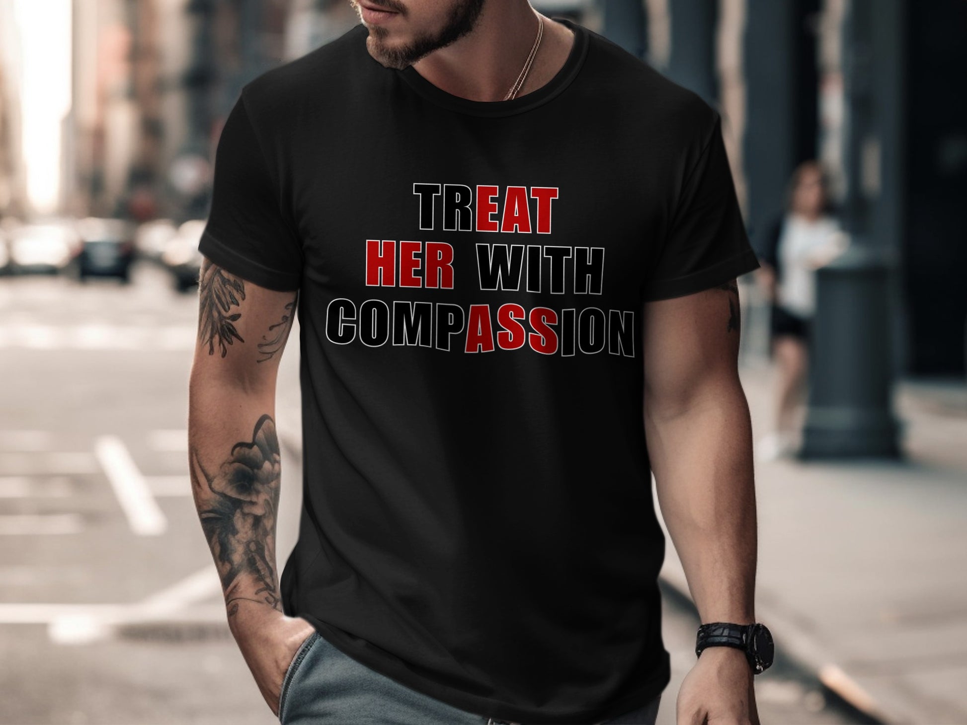 Black t-shirt with text "TREAT HER WITH COMPASSION" displayed across the chest.