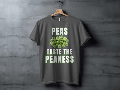 Dark grey t-shirt with text "PEAS TASTE THE PEANESS" and pile of peas.