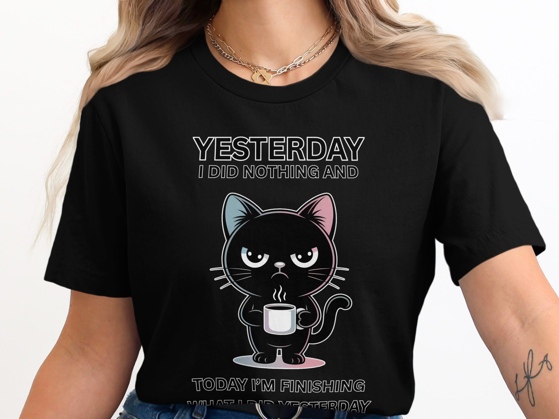 Black t-shirt with cartoon cat holding a coffee mug and text.