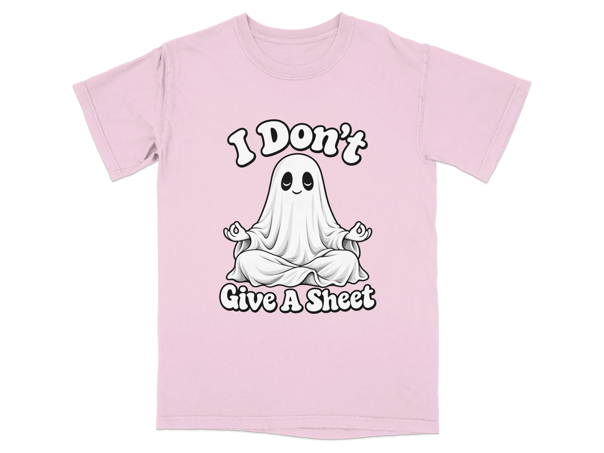 Pink t-shirt with a cartoon ghost meditating and text that reads "I Don't Give A Sheet".