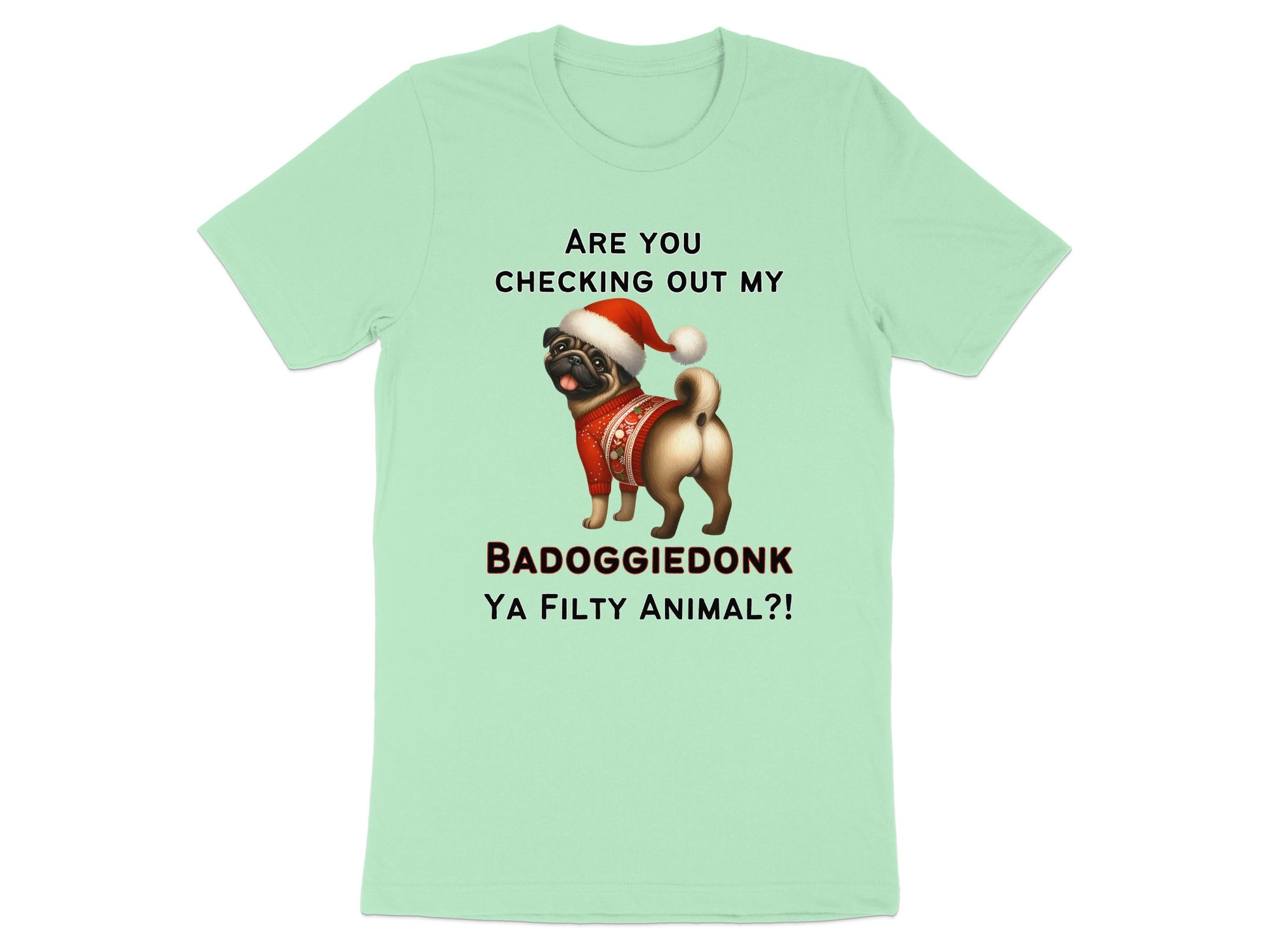 Light green t-shirt with a pug in a Santa hat and sweater, and text.