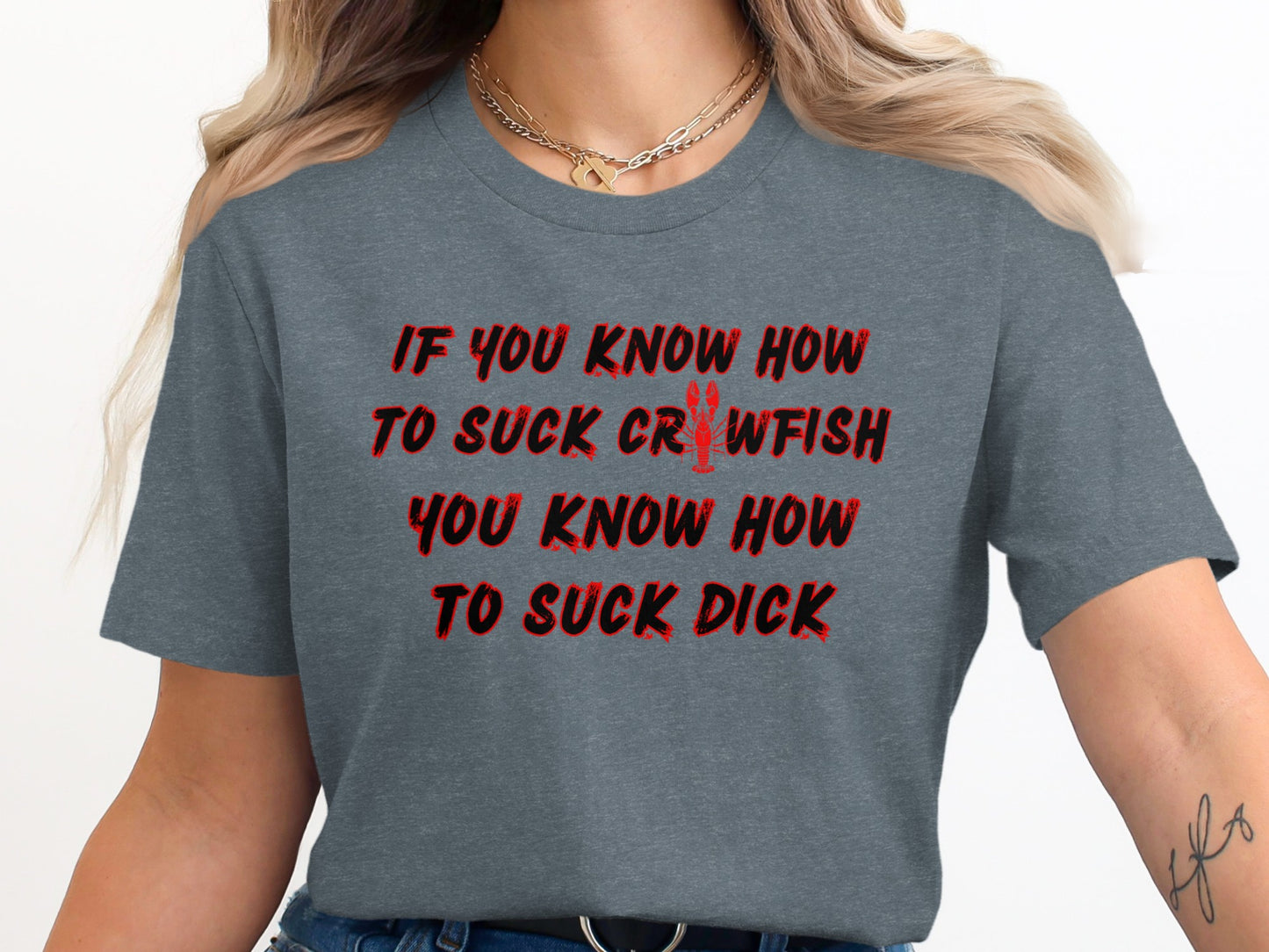 Grey t-shirt with red text: If you know how to suck crawfish, you know how to suck dick.