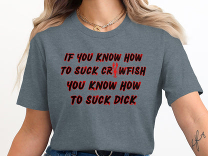 Grey t-shirt with red text: If you know how to suck crawfish, you know how to suck dick.
