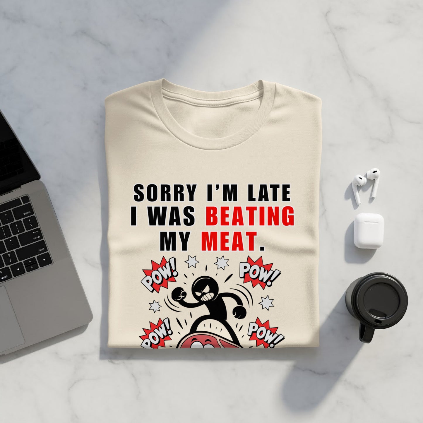 Cream t-shirt with "Sorry I'm Late I Was Beating My Meat" text and comic graphic.