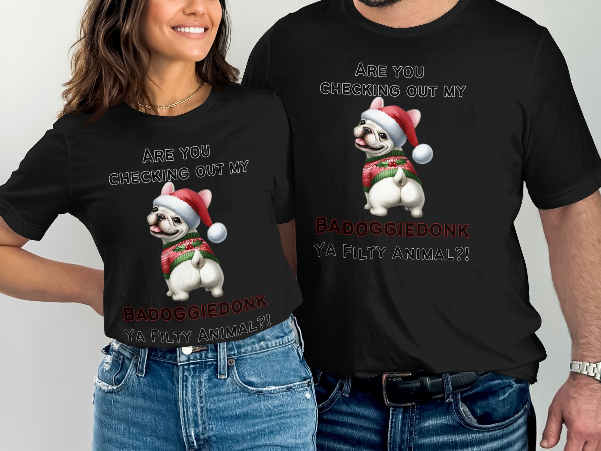 Black t-shirts with French bulldog wearing Santa hat and sweater graphic.