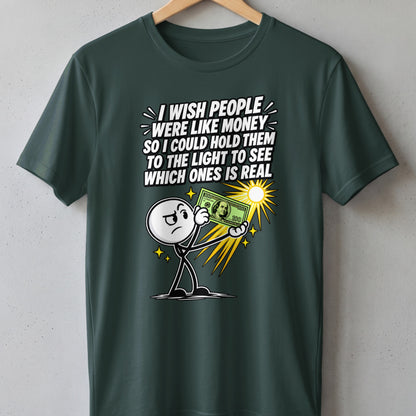 T-shirt with stick figure holding a $100 bill to the light with text.