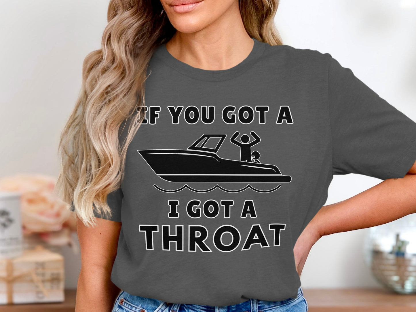 Dark gray t-shirt with text "IF YOU GOT A I GOT A THROAT" and boat graphic.