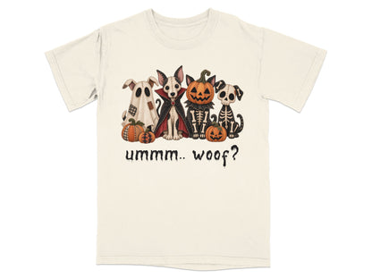 Four Halloween-costumed dogs sit with pumpkins, text reads "ummm.. woof?"