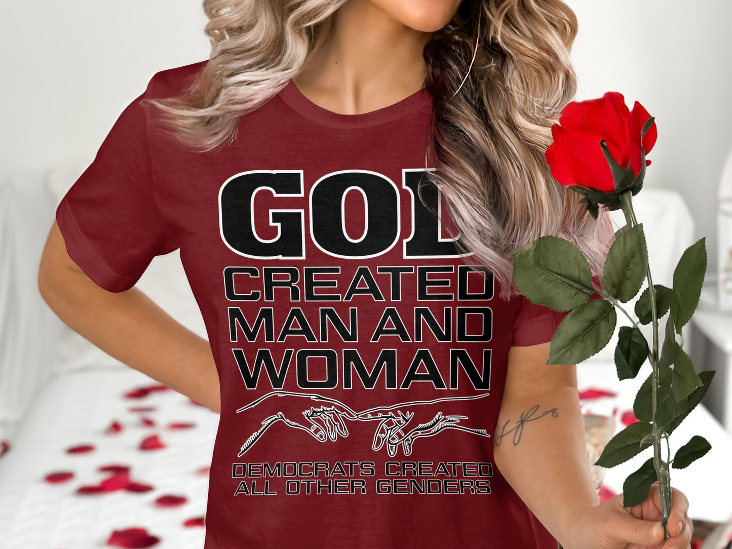 Maroon t-shirt with text "GOD CREATED MAN AND WOMAN" and "DEMOCRATS CREATED ALL OTHER GENDERS".