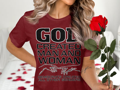 Maroon t-shirt with text "GOD CREATED MAN AND WOMAN" and "DEMOCRATS CREATED ALL OTHER GENDERS".