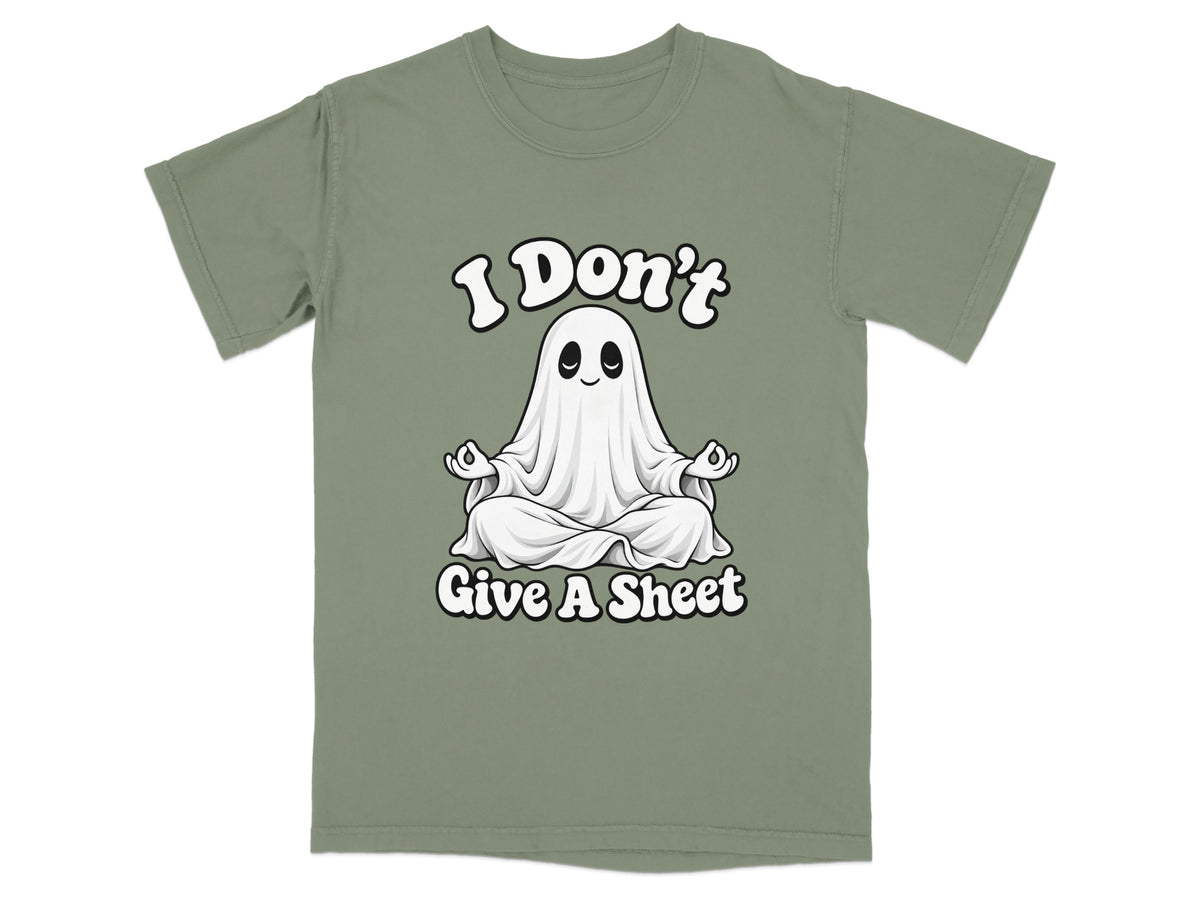 Green t-shirt with a cartoon ghost meditating and text "I Don't Give A Sheet".