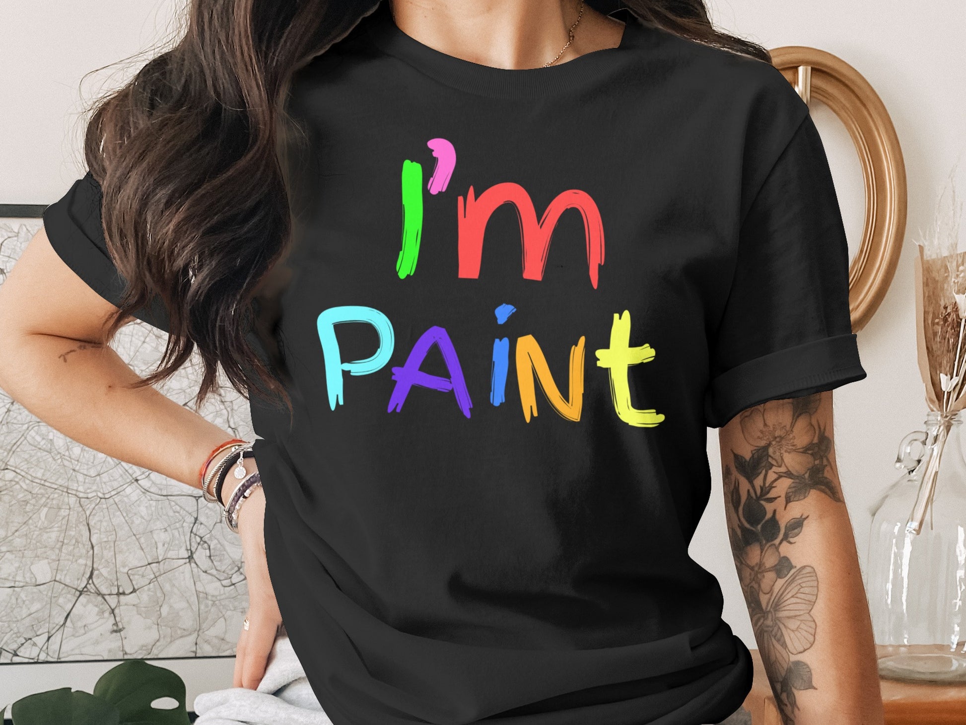 Black t-shirt with colorful "I'm Paint" graphic text.