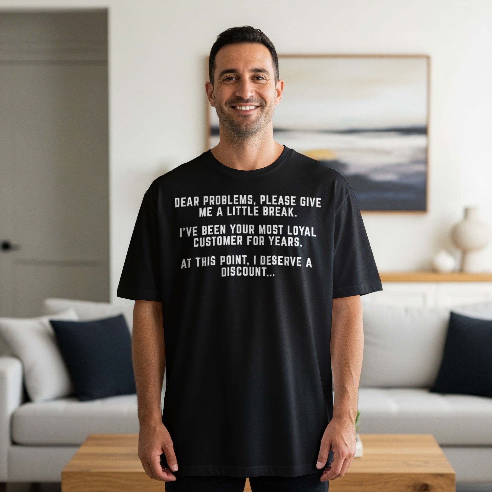 Black t-shirt with text: "Dear problems, please give me a little break."