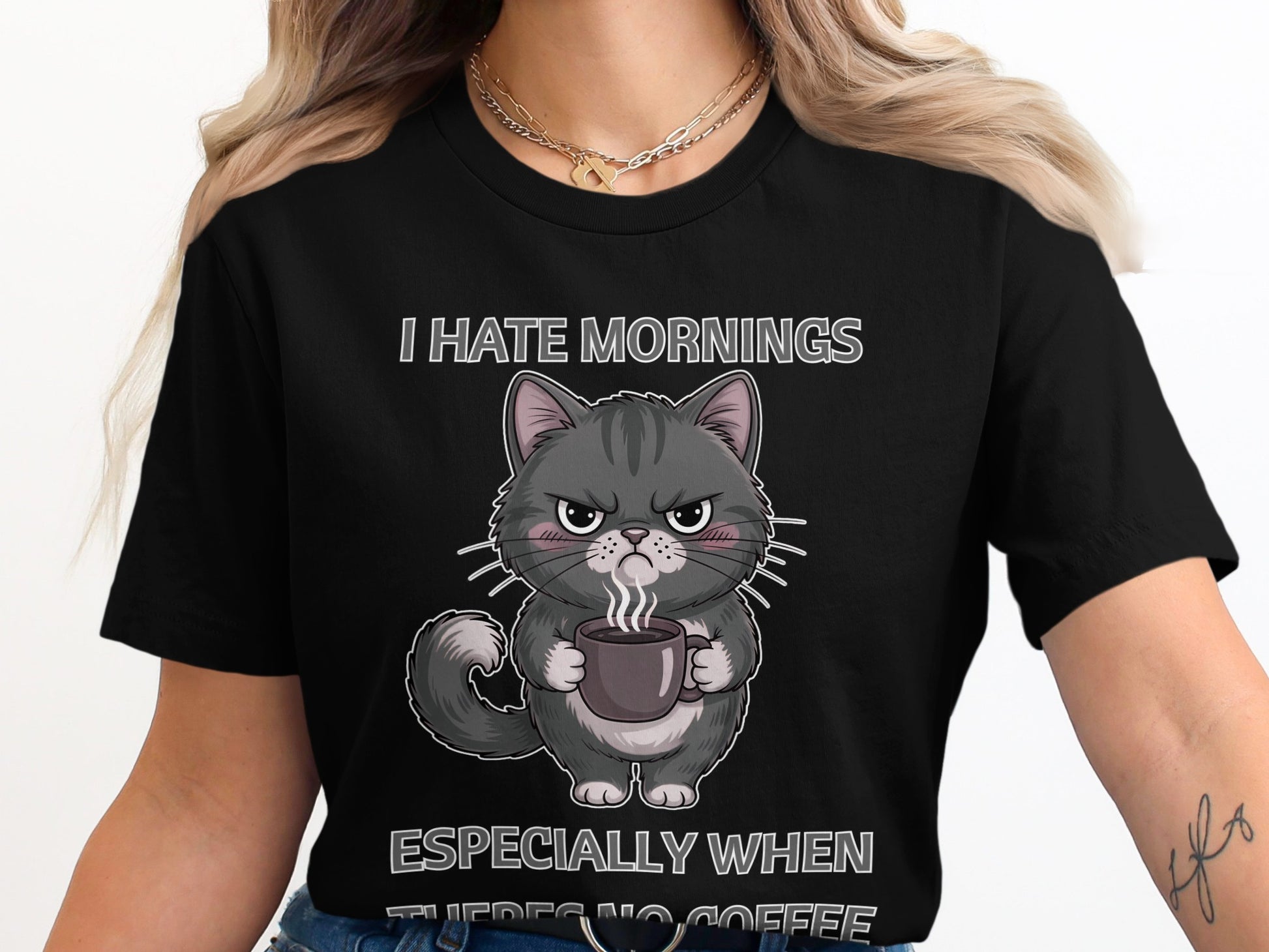 Black t-shirt with cartoon cat holding coffee and text "I HATE MORNINGS ESPECIALLY WHEN THERE'S NO COFFEE".