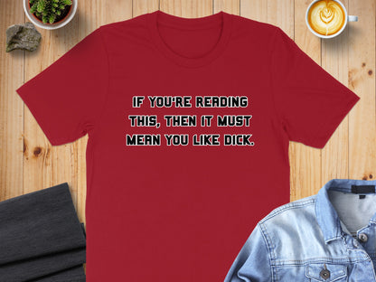 Red t-shirt with text "IF YOU'RE READING THIS, THEN IT MUST MEAN YOU LIKE DICK."