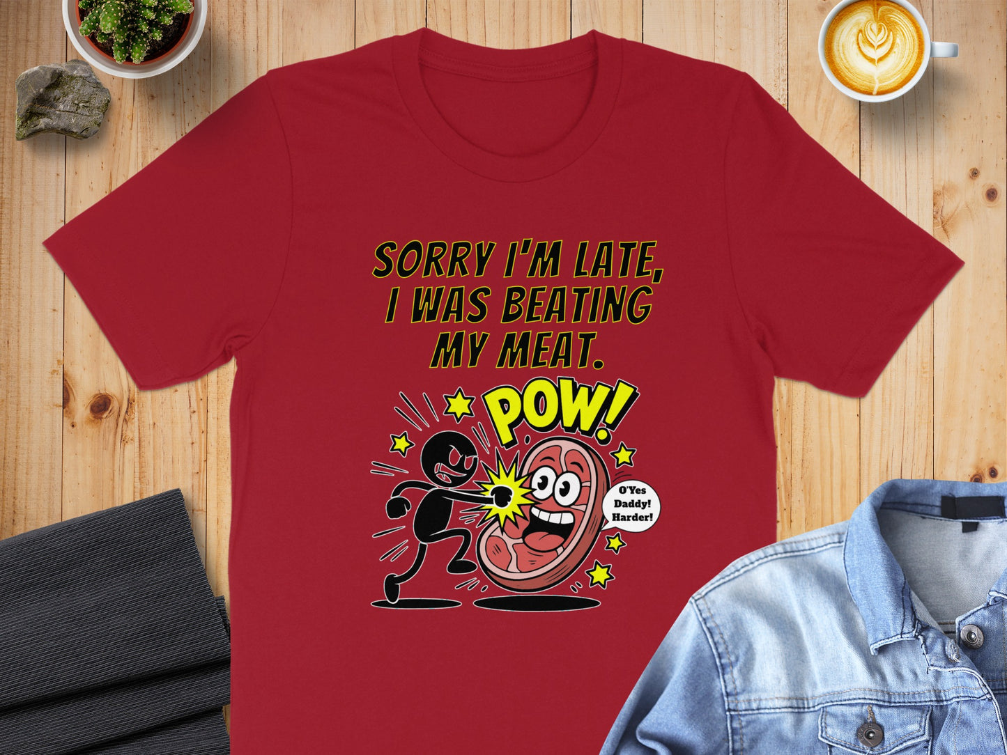 Red t-shirt with cartoon graphic and text: "Sorry I'm late, I was beating my meat. POW!"