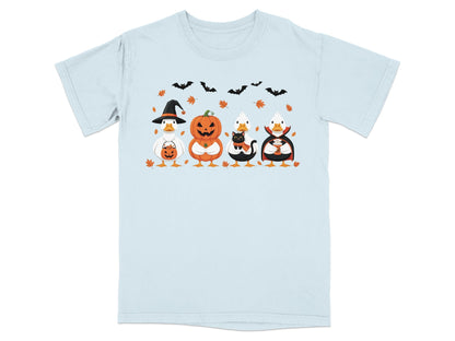 Four ducks in Halloween costumes: witch, pumpkin, black cat, and vampire.