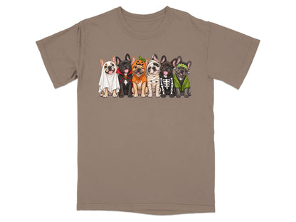 Six French bulldogs in Halloween costumes on a taupe t-shirt.