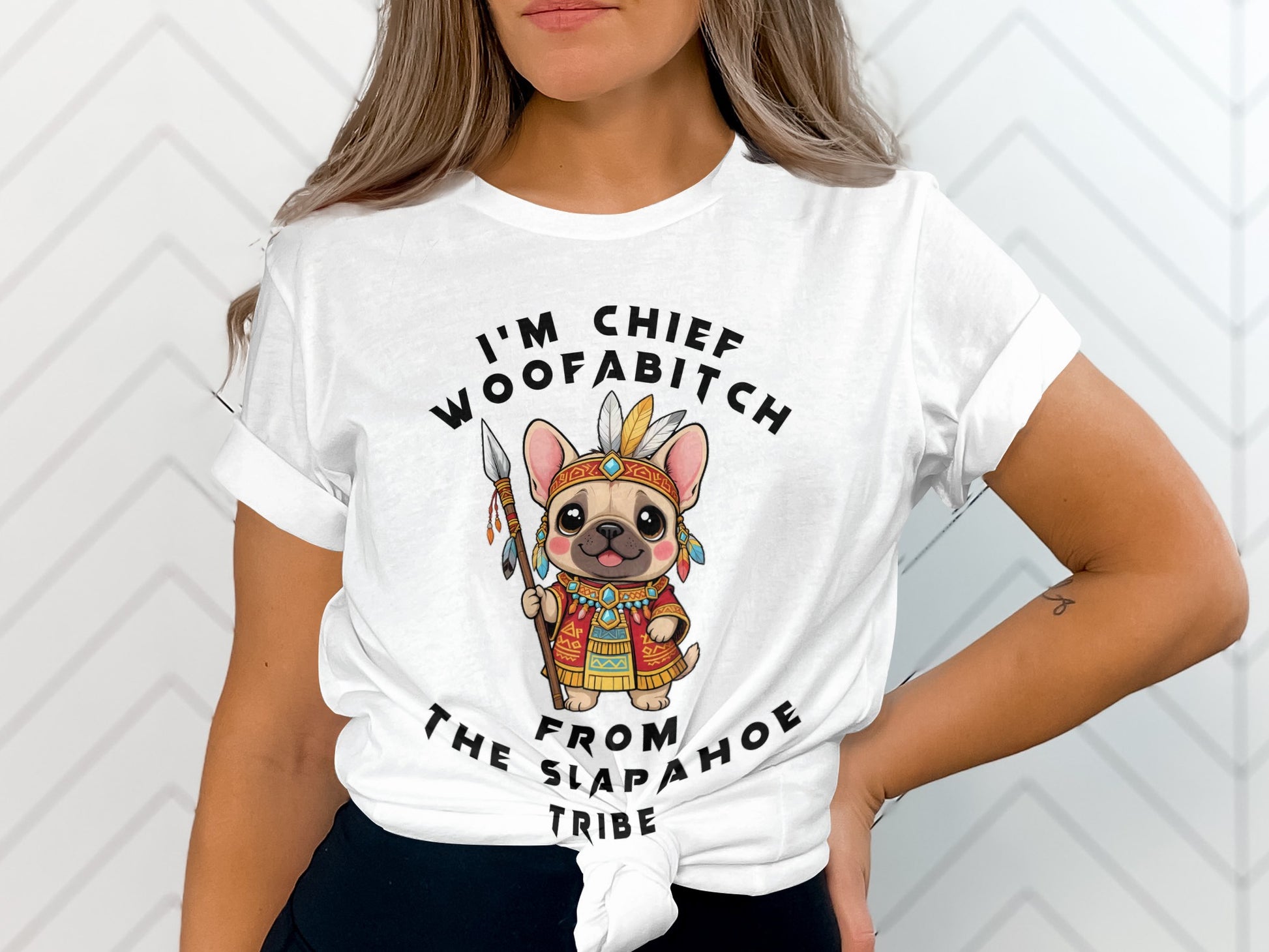 White t-shirt with cartoon French bulldog as chief, holding spear.