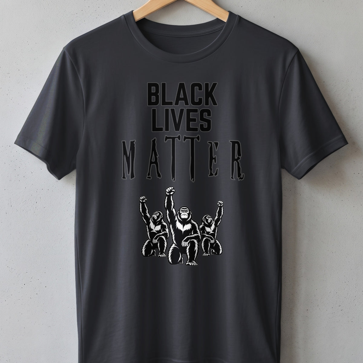Dark gray t-shirt with "BLACK LIVES MATTER" and three gorillas with raised fists.
