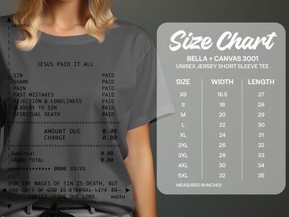 Grey t-shirt with receipt text "JESUS PAID IT ALL" and size chart.