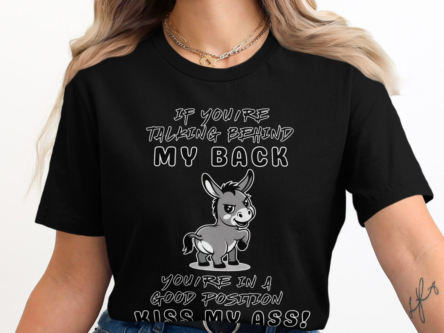 Black t-shirt with donkey saying "If you're talking behind my back you're in a good position kiss my ass!"