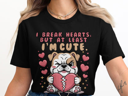 Black shirt with graphic of bulldog holding broken heart, surrounded by hearts and stars.