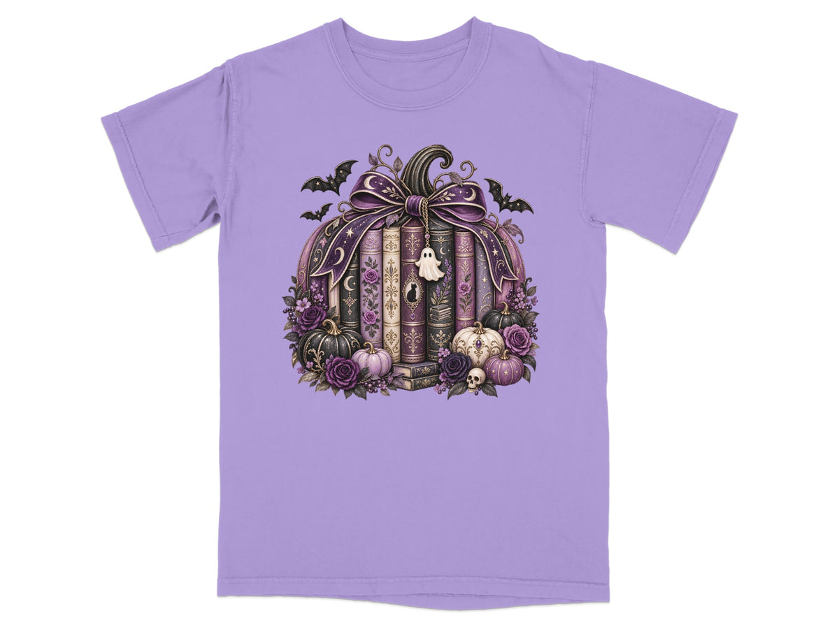 Purple t-shirt with a Halloween-themed pumpkin made of books, flowers, and bats.