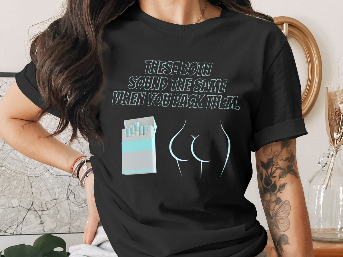 Black t-shirt with cigarettes and stylized buttocks graphic and text.