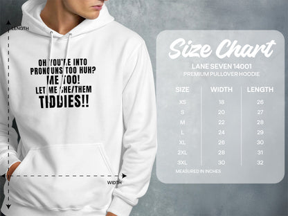 White hoodie with text "Oh you're into pronouns too huh? Me too! Let me she/them tiddies!!" and a size chart.