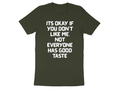 Dark green t-shirt with white text: "Its Okay If You Don't Like Me. Not Everyone Has Good Taste."
