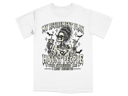 White t-shirt with skeleton graphic and text "My Retirement Plan Haunt People I Keep Receipts".