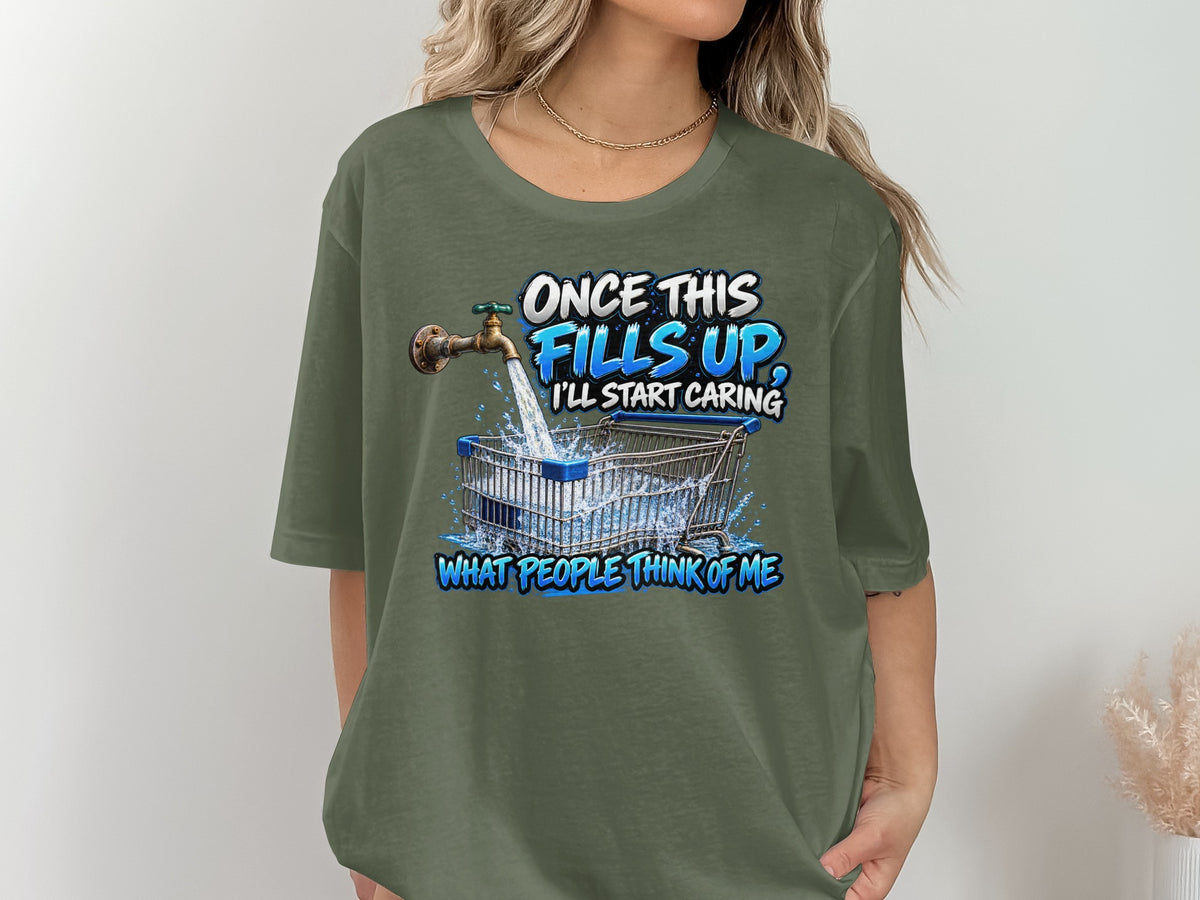 Graphic tee with text "Once this fills up, I'll start caring" and a shopping cart.