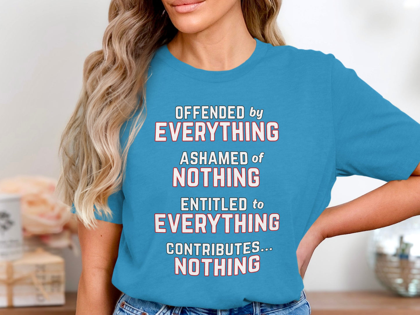 Blue t-shirt with text: Offended by Everything, Ashamed of Nothing, Entitled to Everything, Contributes... Nothing.