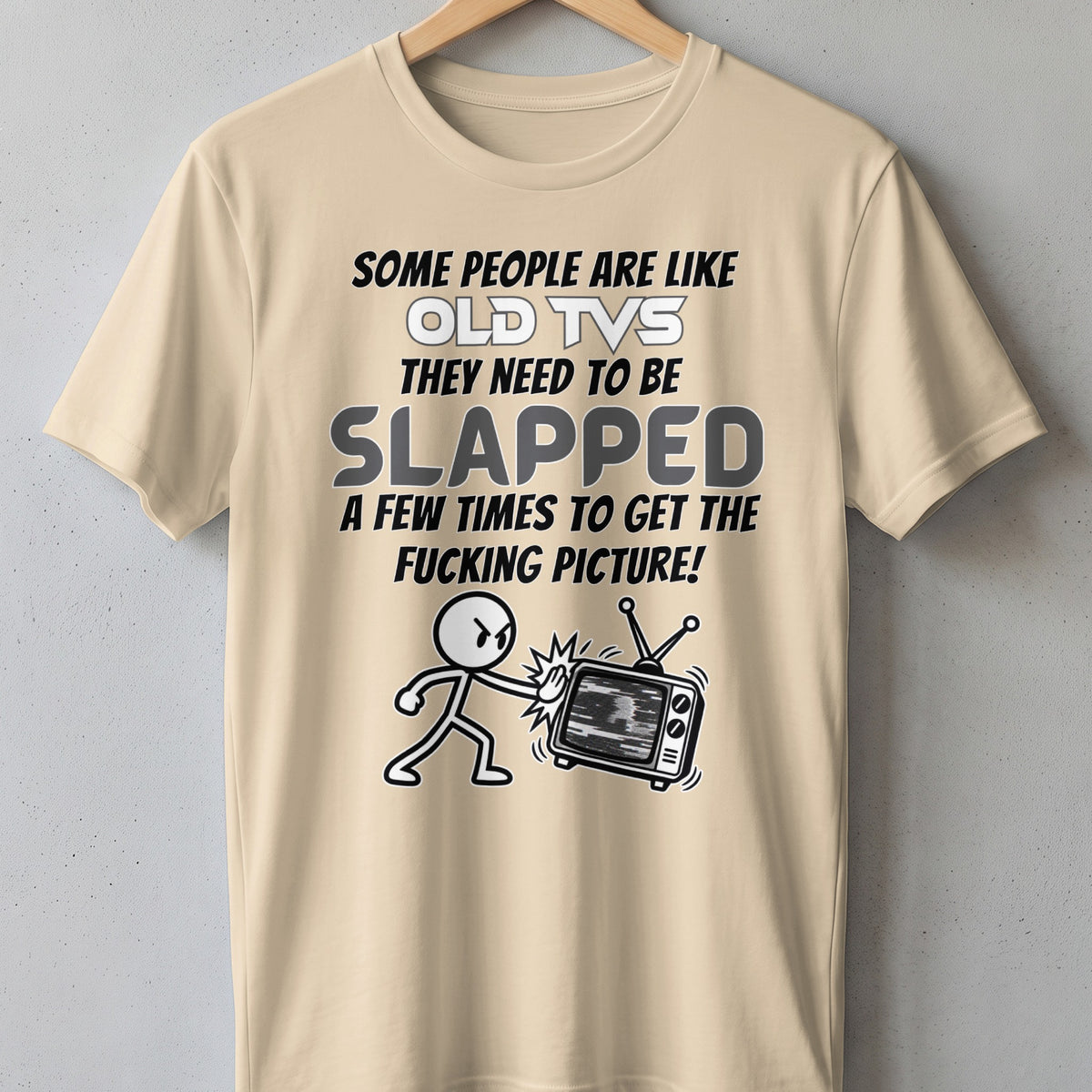 T-shirt with "Some people are like old TVs, they need to be slapped" graphic.